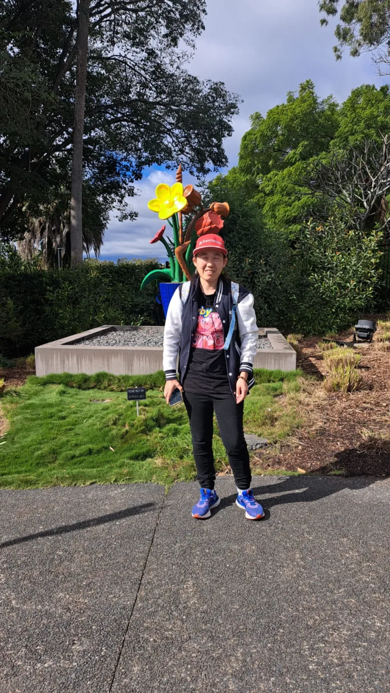 A participant enjoying a day out at the botanic gardens