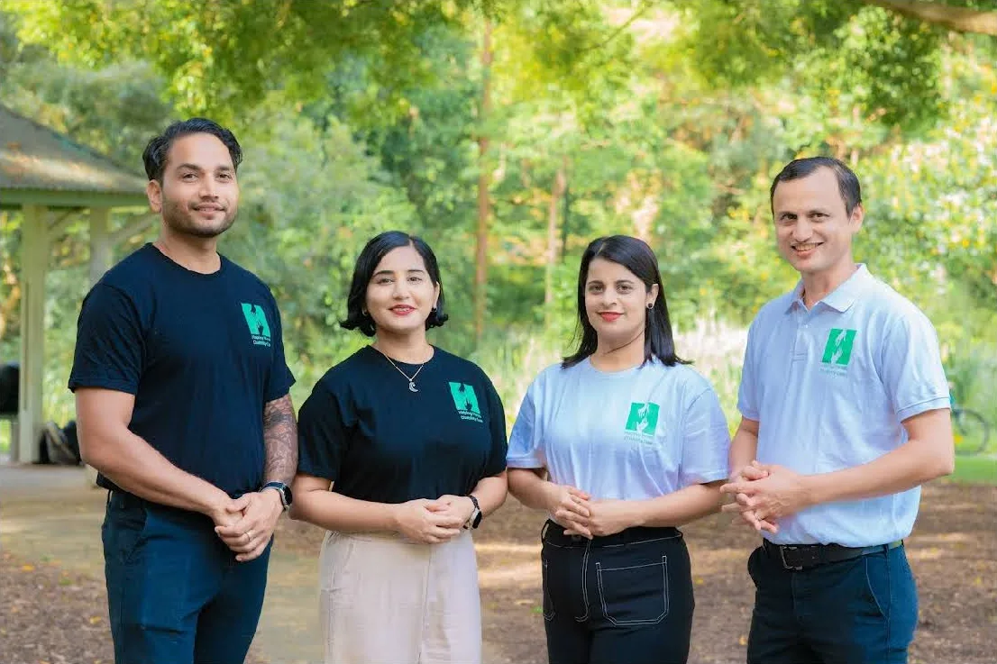 The Helping Hands Disability Care team together outdoors